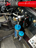 Heavy duty truck steering and King suspension component with remote reservoir