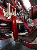 Heavy duty truck air suspension system with red shock absorber and Goodyear air spring