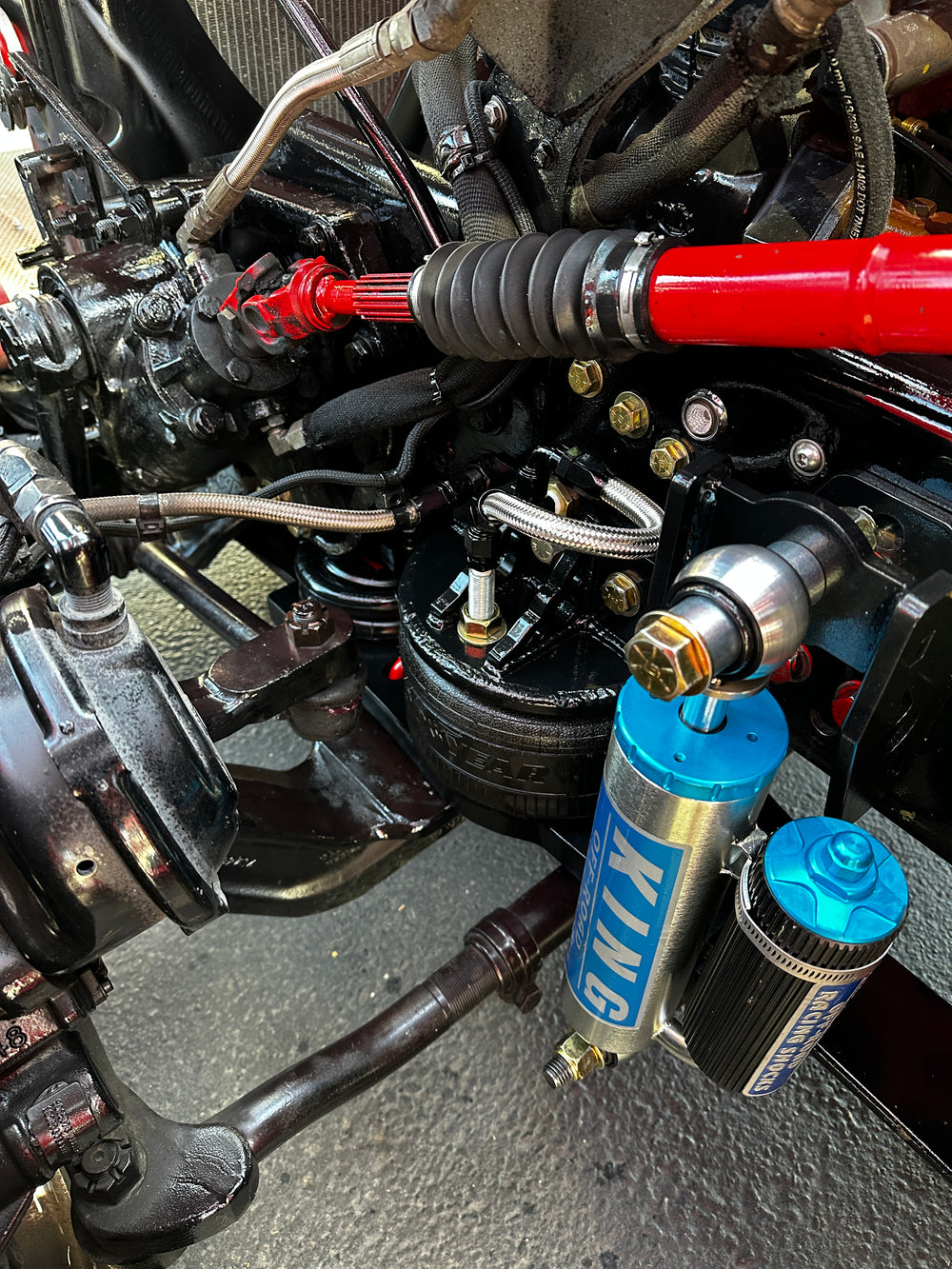 Heavy duty truck suspension and steering components with King Off-Road shock reservoir