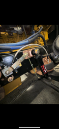 Heavy duty truck suspension and steering components with hoses, brackets, and shock absorber