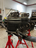 Heavy duty truck air suspension kit with metal brackets and Goodyear air springs in repair shop