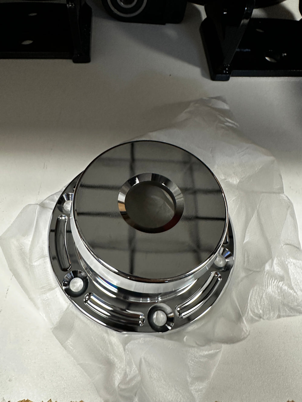 Billet chrome steer axle hub cap