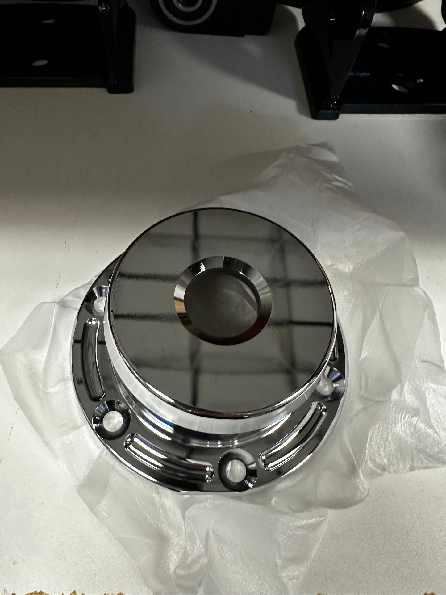 Billet chrome steer axle hub cap