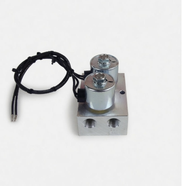 Mechanical component with two cylindrical parts and a wire on a white background
